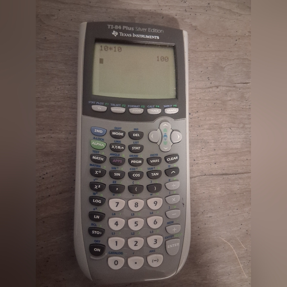TEXAS INSTRUMENTS GRAPHING CALCULATOR TI-84 PLUS SILVER EDITION - READ DESCRIPTI